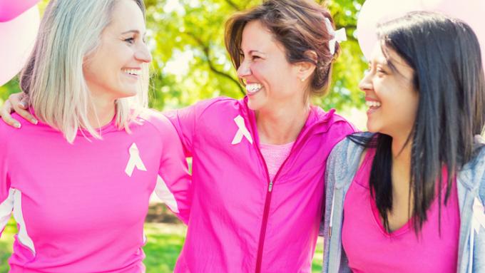 Photo of women wearing pink shirts