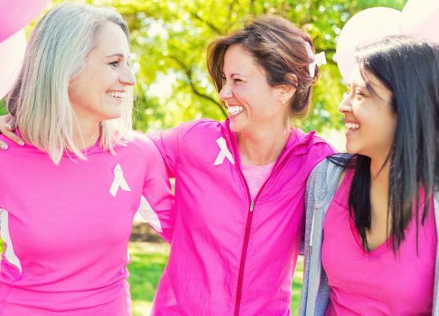 Photo of women wearing pink shirts